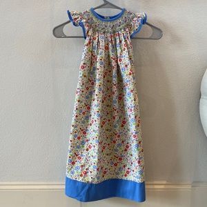 Girl’s Vive Le Fete floral smocked dress size 5. 100% cotton. Perfect condition